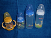 4 Weithalsflaschen,Kunststoff,1x Winnie Pooh
